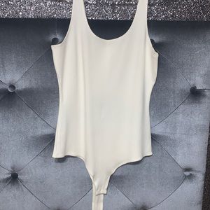 Stretchy Cream/white body suit; size Medium